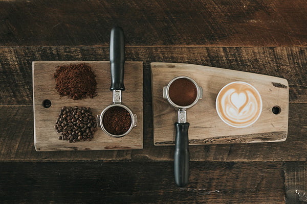 Coffee latte, ground coffee, and coffee beans