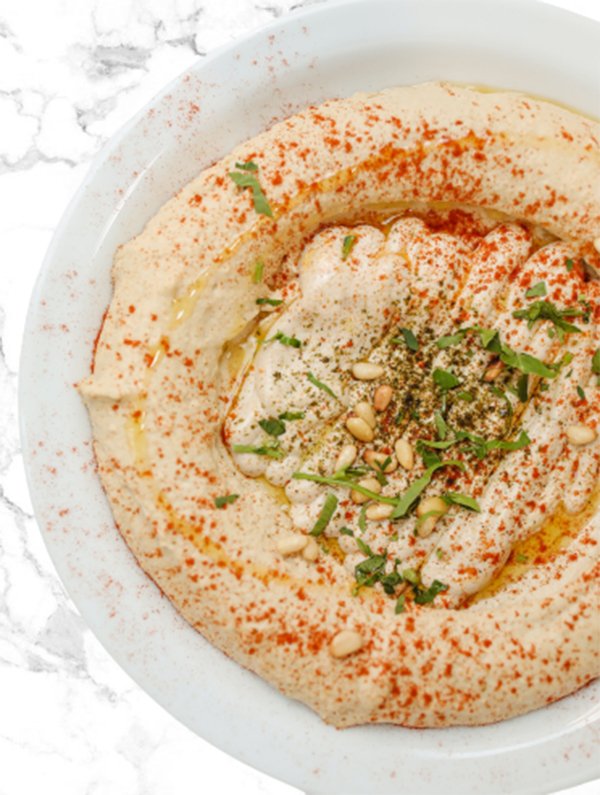 hummus against marble background