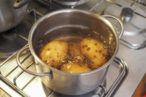 Boiling potatoes in saucepan